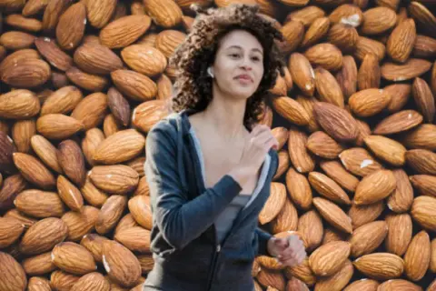 Mujer corriendo con fondo de almendras, descubriendo los 10 beneficios de la almendra para tu salud y energía.